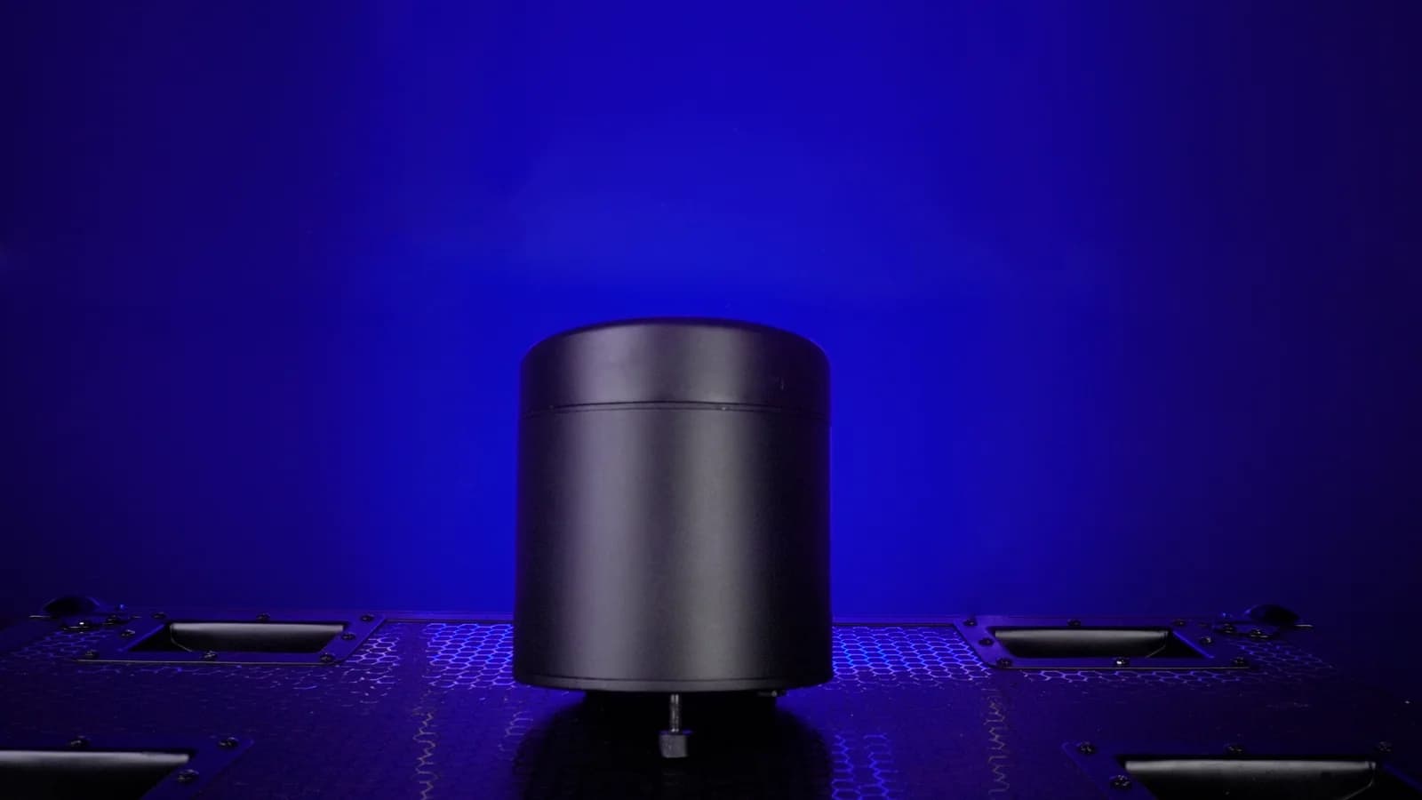 LumiUp Aqua P6 battery powered uplight standing upright during a studio product shoot