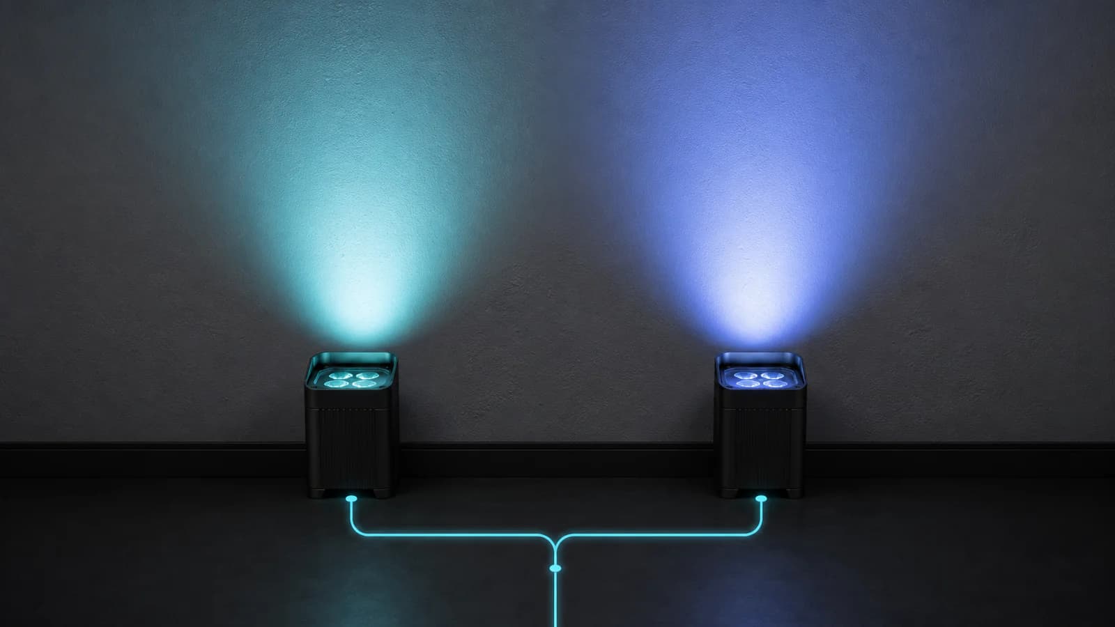 Two identical battery uplights producing slightly different cyan-blue colors from the same control signal