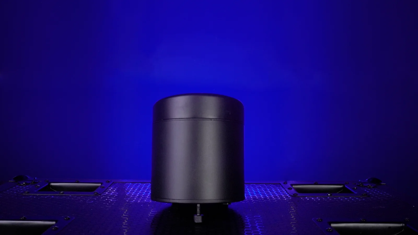 LumiUp Aqua P6 battery powered uplight standing upright during a studio product shoot