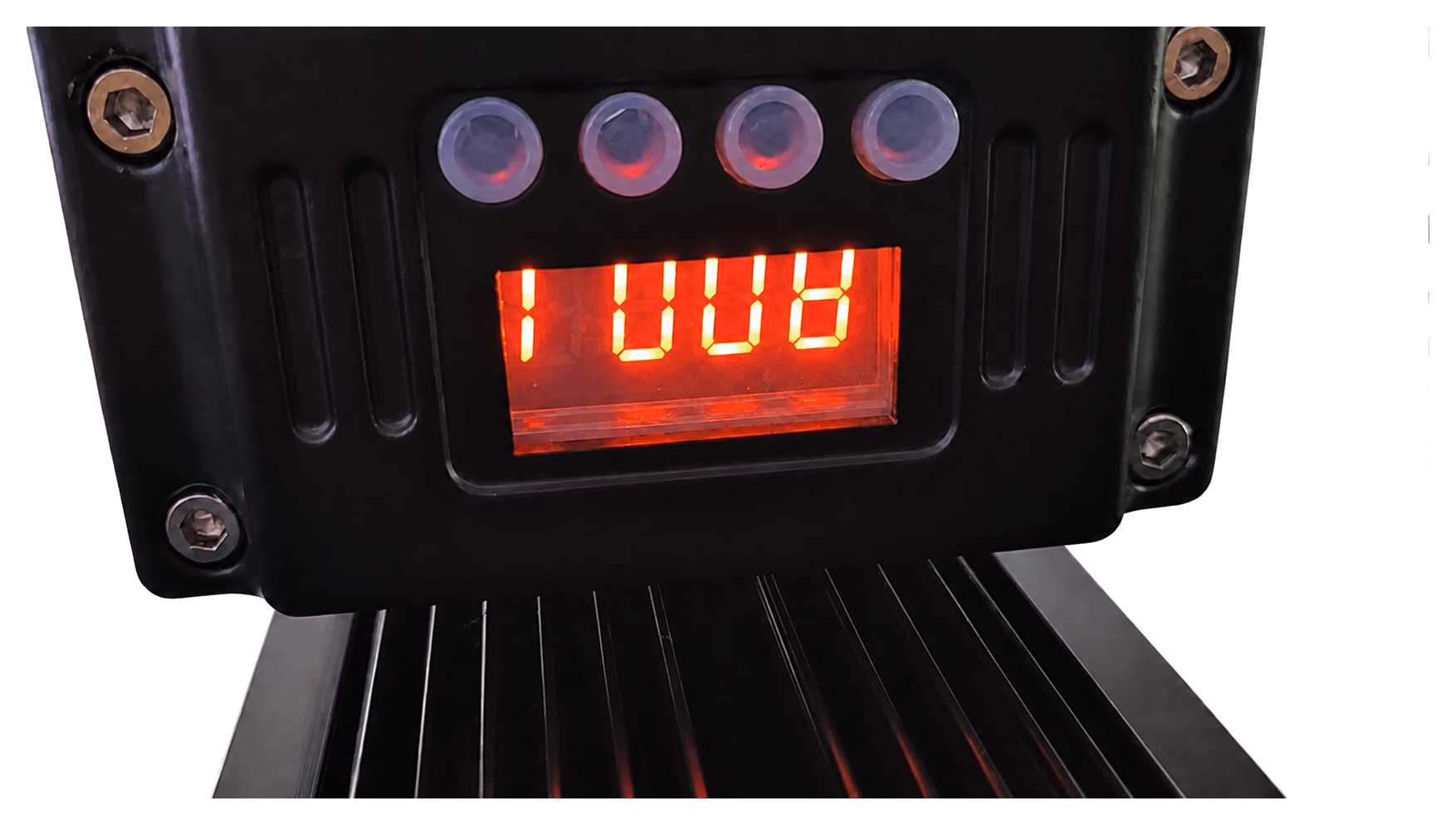 Close-up of the LumiUp Flex W18 Pro four-button LED control panel and illuminated digital display
